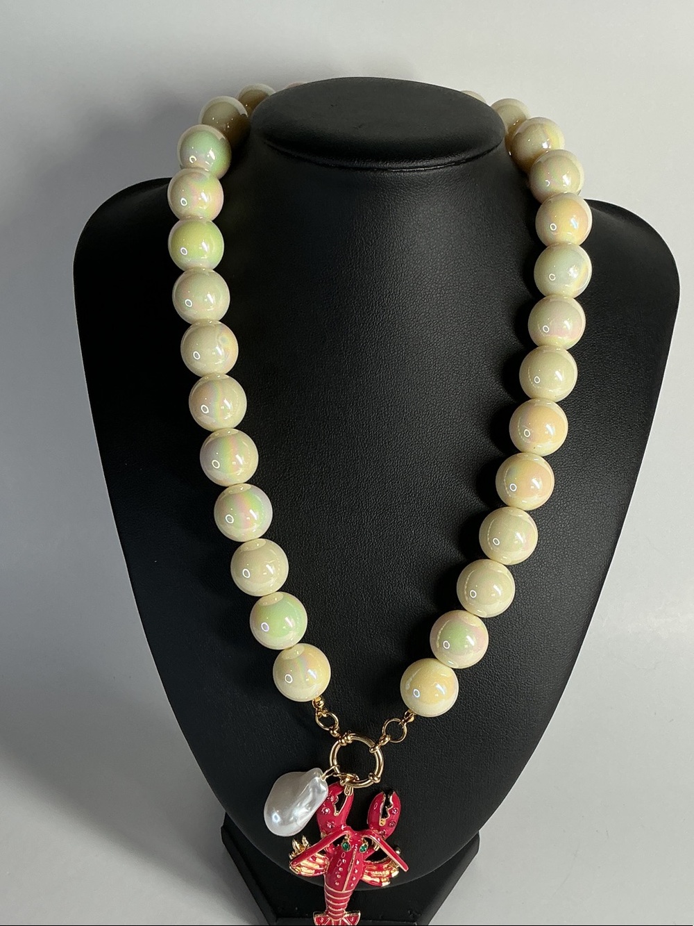 Iridescent Cream Bead Necklace with Pink Lobster Charm